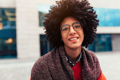 Portrait of smiling young man wearing eyeglasses
