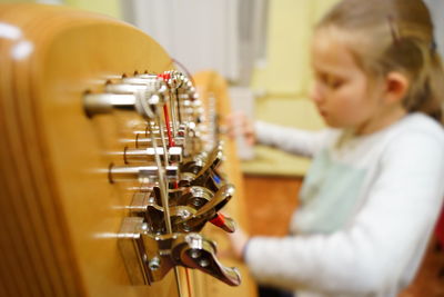 Girl playing harp