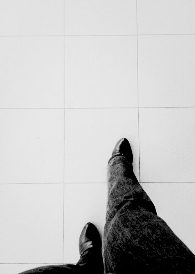 low section, person, shoe, personal perspective, human foot, footwear, standing, tiled floor, indoors, part of, high angle view, flooring, men, unrecognizable person, tile, human limb, lifestyles