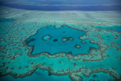 High angle view of blue sea