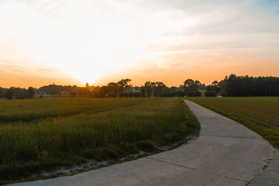 Scenic view of landscape against sky during sunset