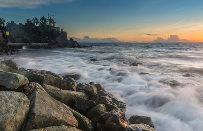 Scenic view of sea against sky during sunset