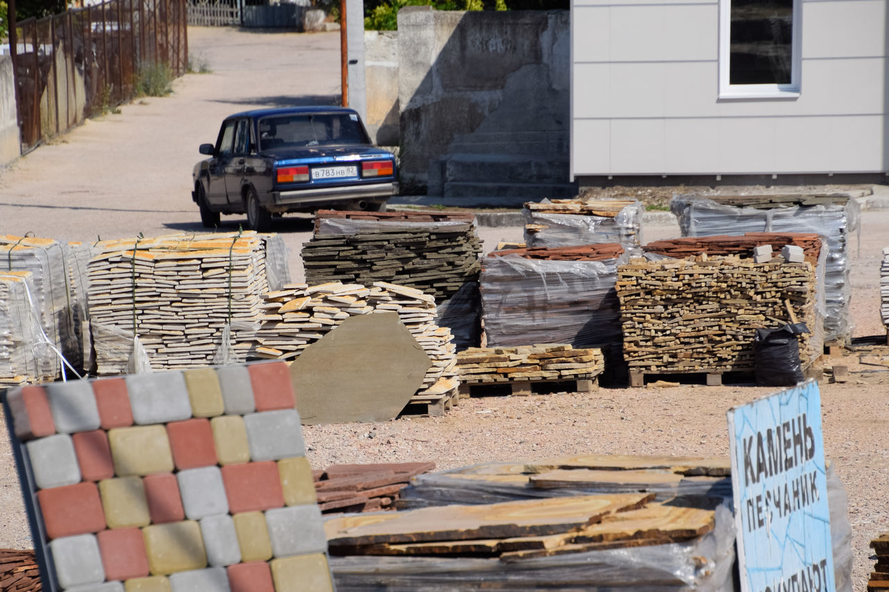 STACK OF FOR SALE IN STREET