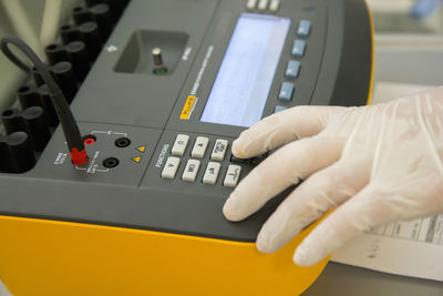 Close-up of hand using computer keyboard