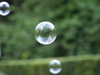 Close-up of bubbles on water