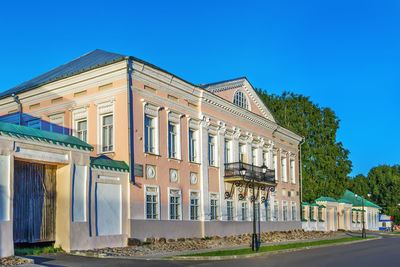 Facade of historic building against clear blue sky