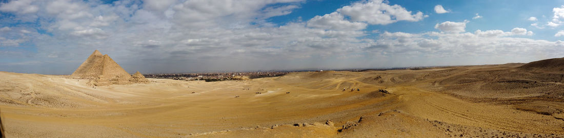 Panoramic view of desert against sky