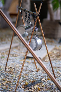 Close-up of bicycle hanging on metal