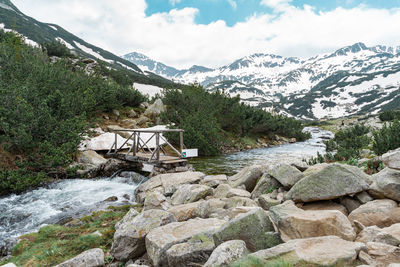 Scenic view of rocky mountains against sky