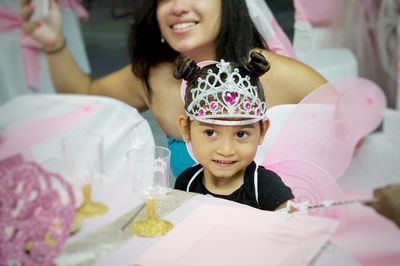 High angle view of birthday girl wearing fairy costume in party