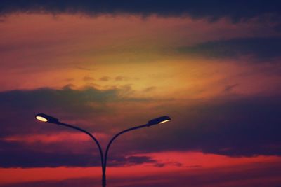 Low angle view of cloudy sky at sunset