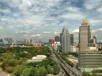 Modern buildings in city against sky