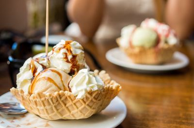 Close-up of fresh ice cream served on table