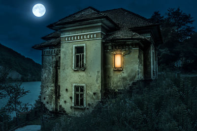 Low angle view of illuminated building at night