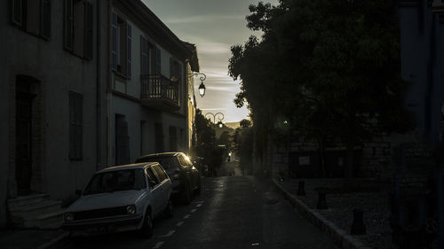 Car in city against sky