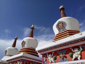 Low angle view of church against blue sky