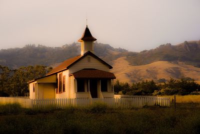 Exterior of abandoned temple against sky