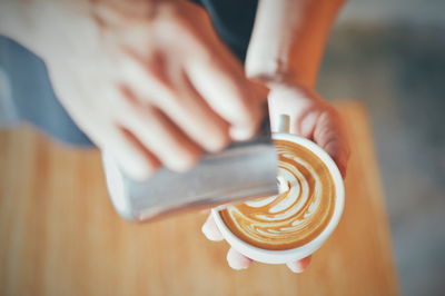 Close-up of woman holding ice cream