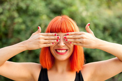 Portrait of smiling young woman