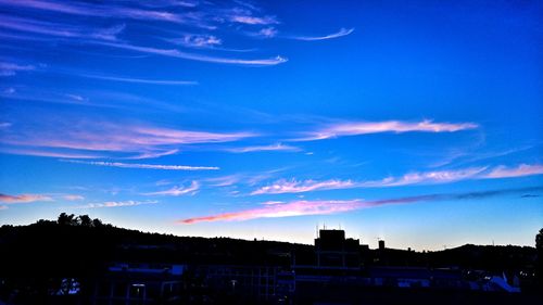 View of buildings at sunset