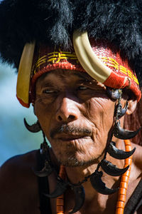 Close-up portrait of man wearing mask