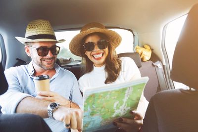 Man and woman sitting in car 