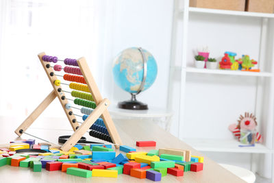 Close-up of toys on table at home