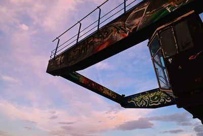 Low angle view of abandoned ship against sky