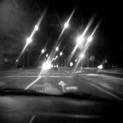 Illuminated street light at night