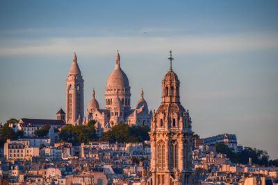 Basilique du sacre coeur in city against sky