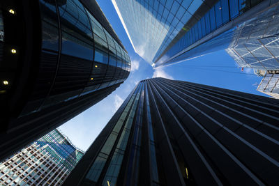 Low angle view of modern buildings against clear sky