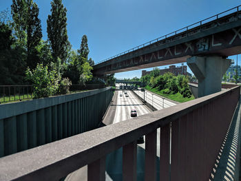 Low angle view of bridge over river against sky