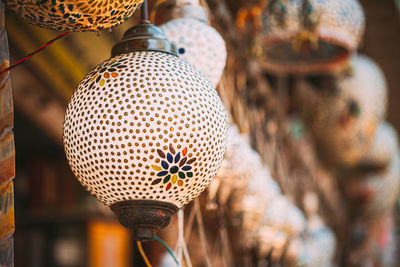 Close-up of decorations hanging in market