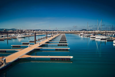 Boats moored in harbor