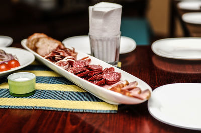 Close-up of breakfast served on table