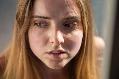 Close-up portrait of a beautiful young woman