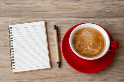 High angle view of coffee cup on table