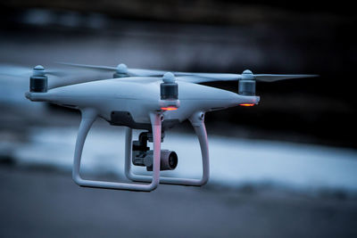 Close-up of drone against sky