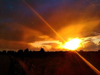 Scenic view of landscape at sunset