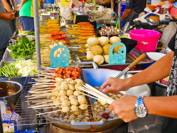 Variety of food for sale at market stall