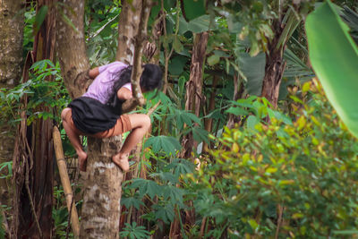 Full length of woman in forest