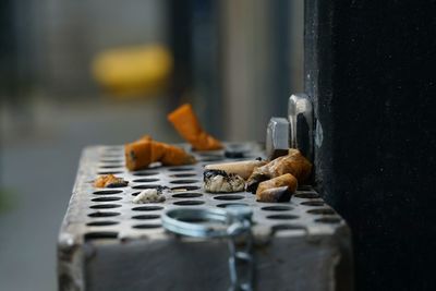 Close-up of cigarette in container