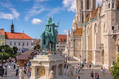 Holy trinity square on the upper town buda in budapest, hungary, on a sunny summer morning