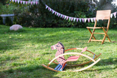 Chair on field in park