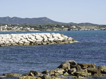 Scenic view of sea against clear sky