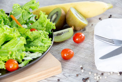 Fruits and vegetables on cutting board