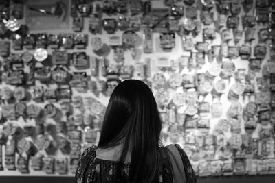 Low section of woman standing in store