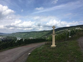 Road amidst landscape against sky