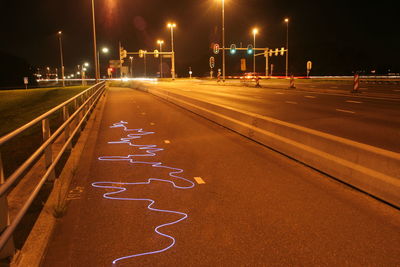 Light painting on road at night