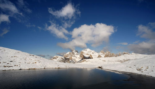 First snow on dolomites, walking on altopiano della rosetta